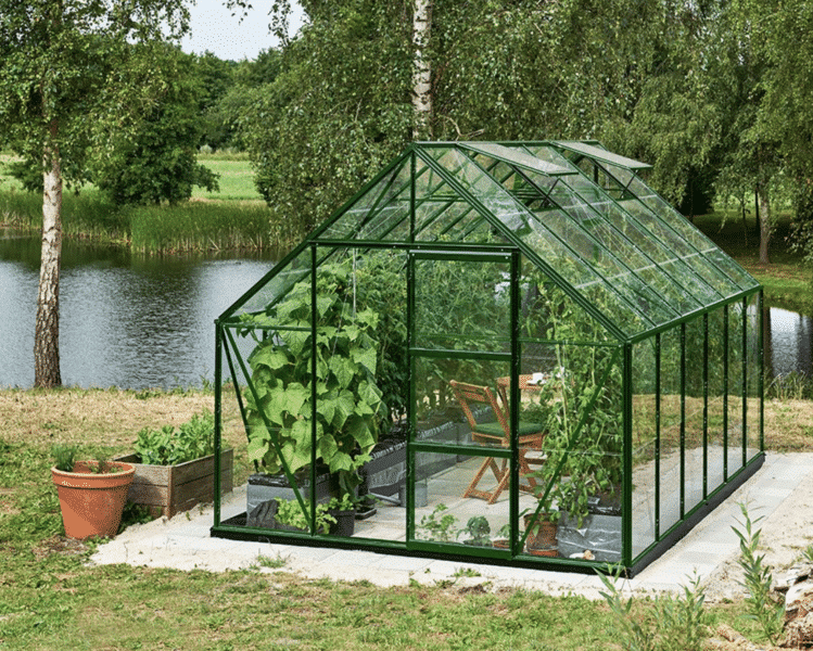 Greenhouse Halls Universal 9.9 m² with a green frame and glass